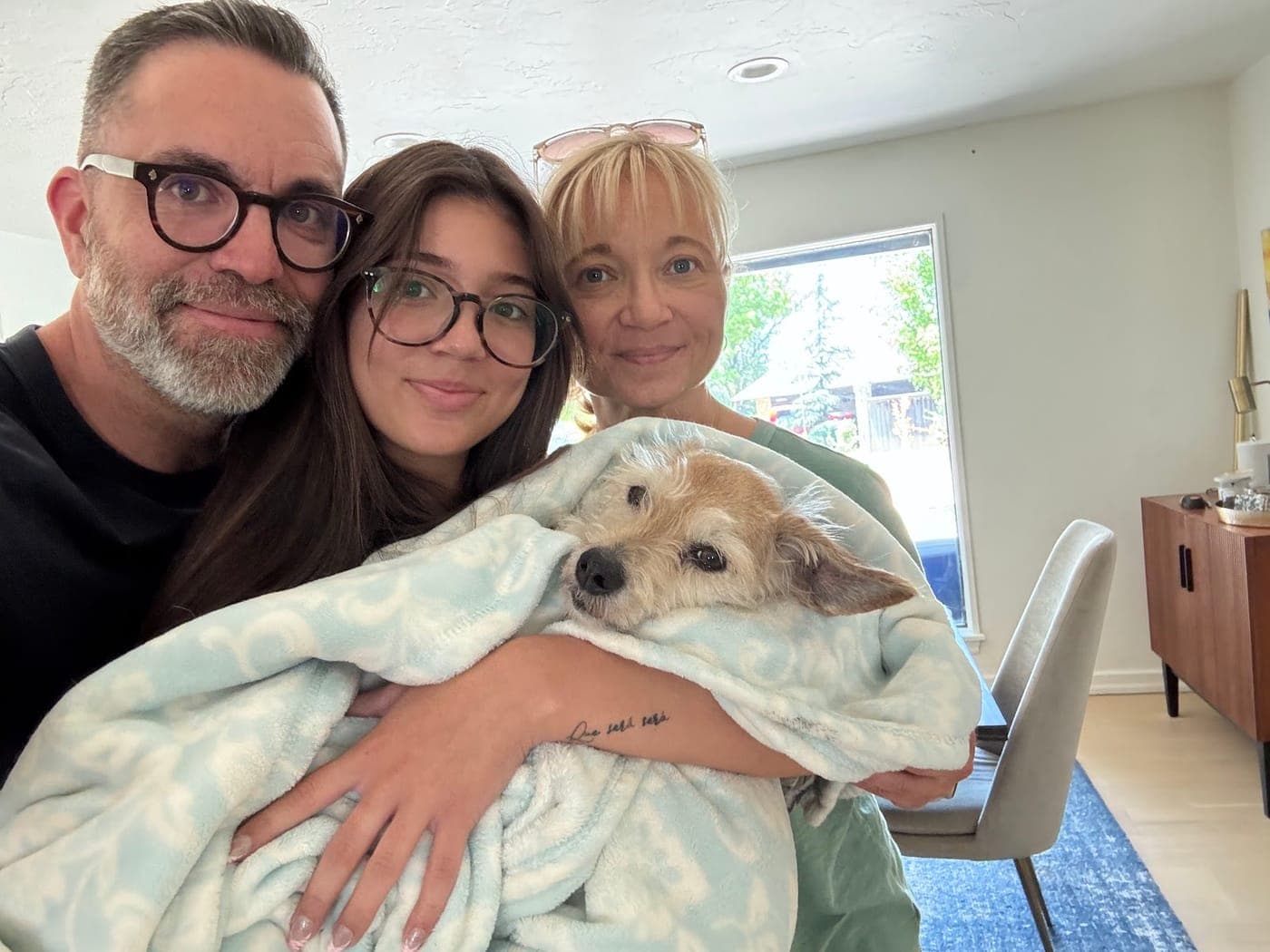 Terry, his daughter, and Robin with Ollie on his last day