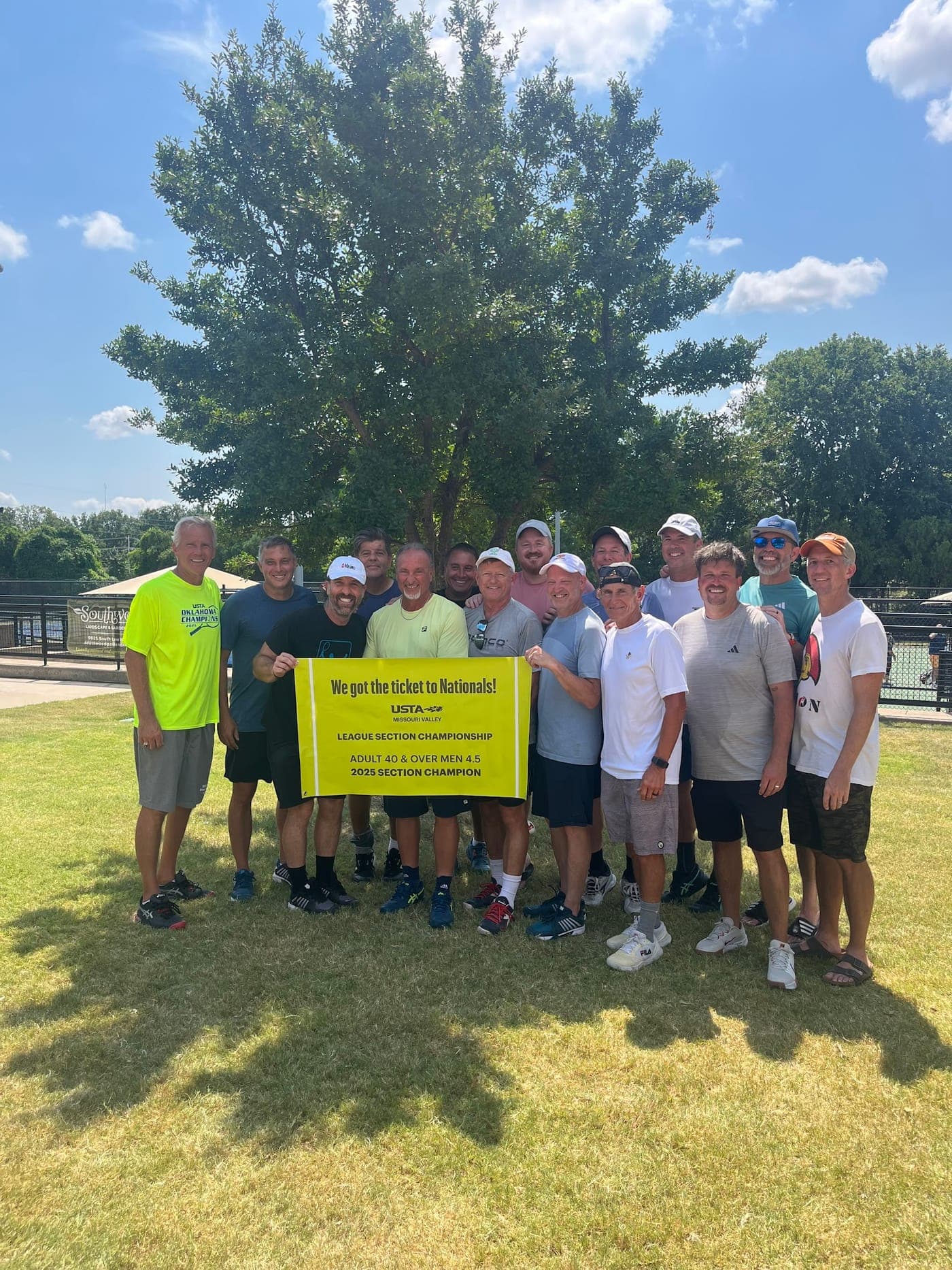 2025 USTA 4.5 40s Nationals team with the section champion banner